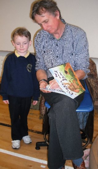 Callum in P2 has his book signed by Malachy Doyle